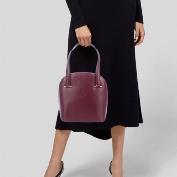 Cartier Handbags - Cartier Bordeaux textured leather handle bag